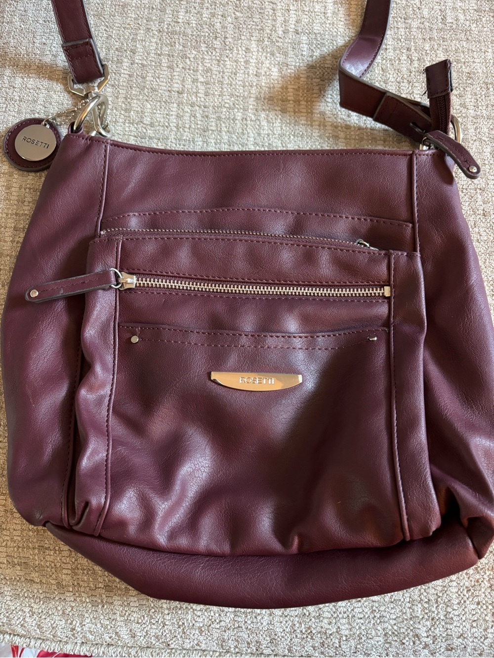 Rosetti Wine/Burgundy Crossbody Bag with Front Zip Pocket